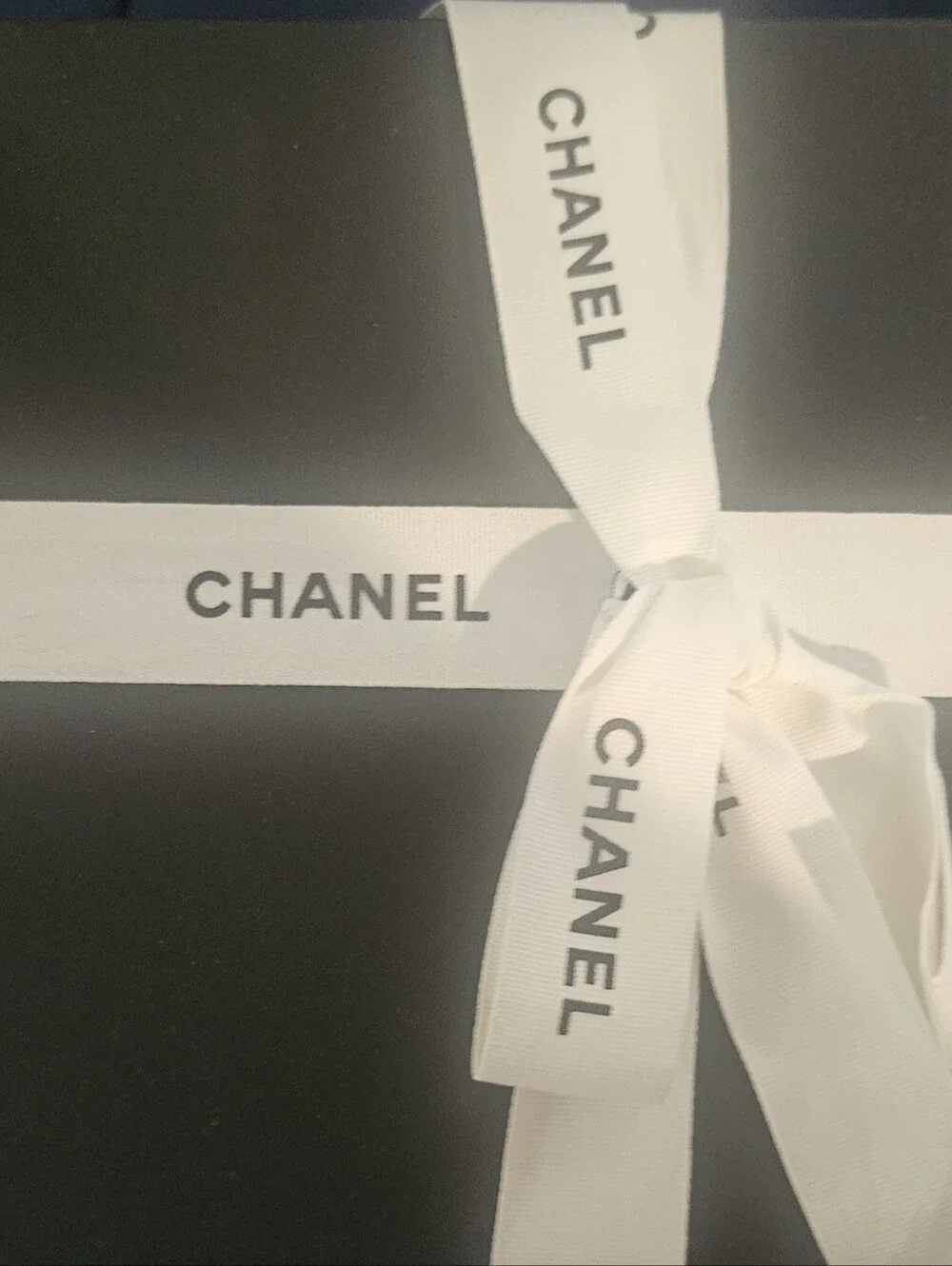 CHANEL Black Quilted Leather Clutch with CC Logo